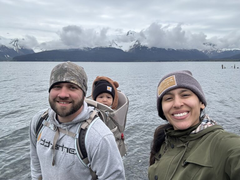 Family walking by water