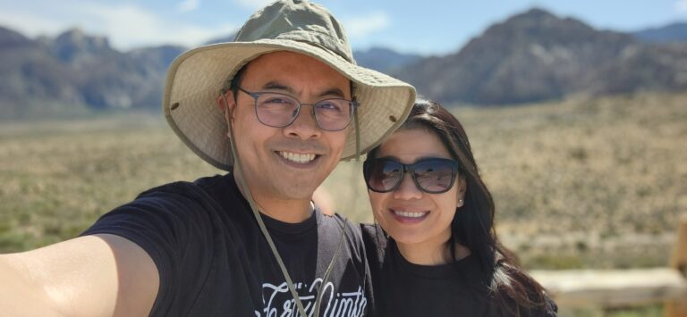 Man hugging women in dessert