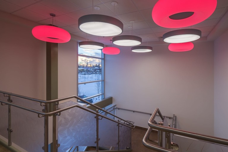 Decorative red and white lighting in stairwell