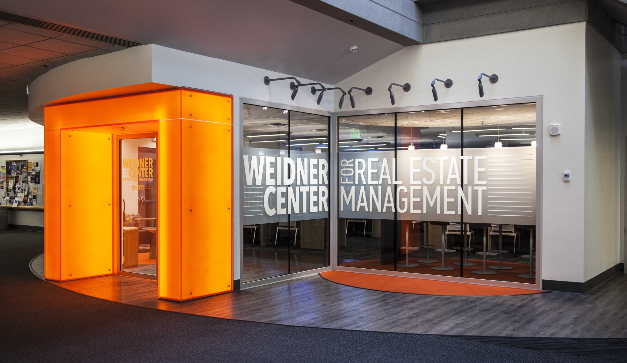Bright orange entryway to room