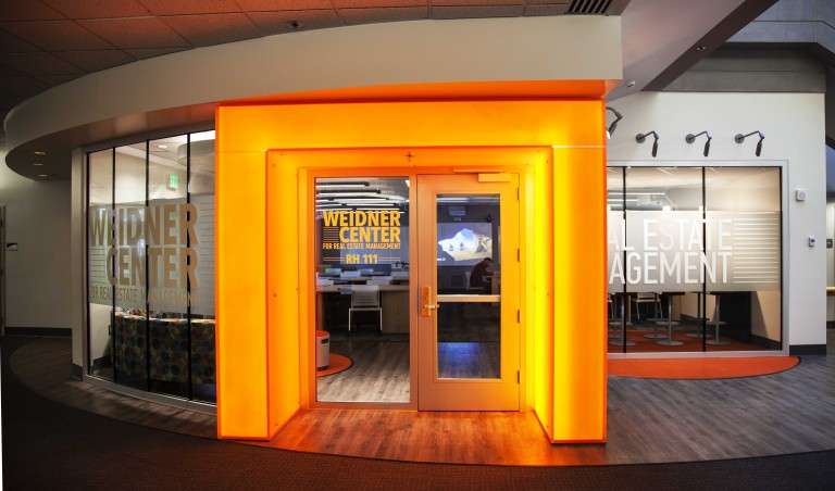 Bright orange entryway to room