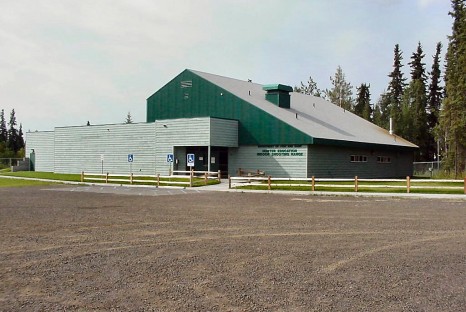 Exterior of metal and wood paneled building