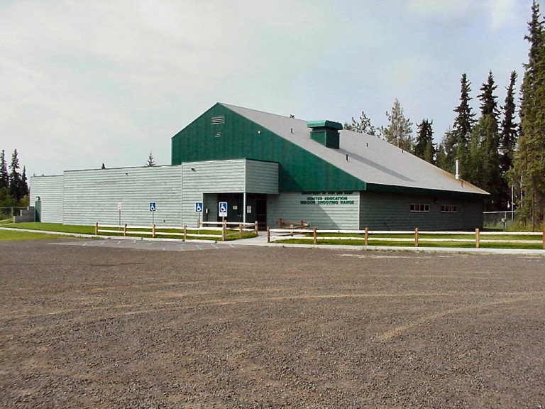 Exterior of metal and wood paneled building